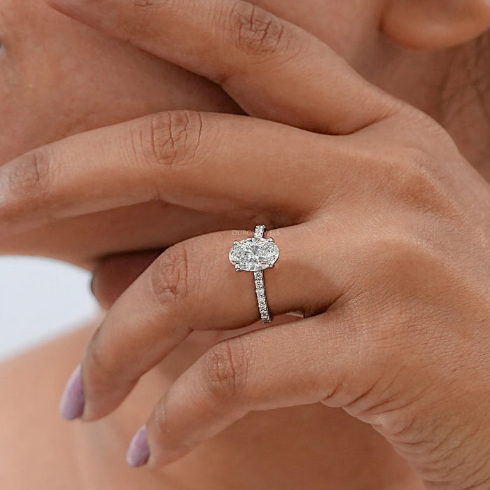 Oval Cut Diamond Engagement Ring with Side Stones