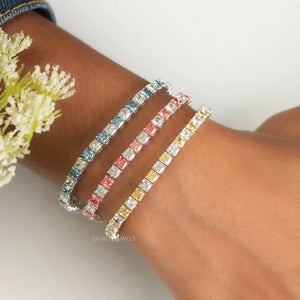 [A Women wearing of Yellow, Blue, Pink Diamond Tennis Bracelet]-[Ouros Jewels]