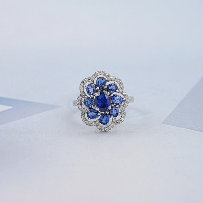 Blue Sapphire and Diamond Floral Halo Ring