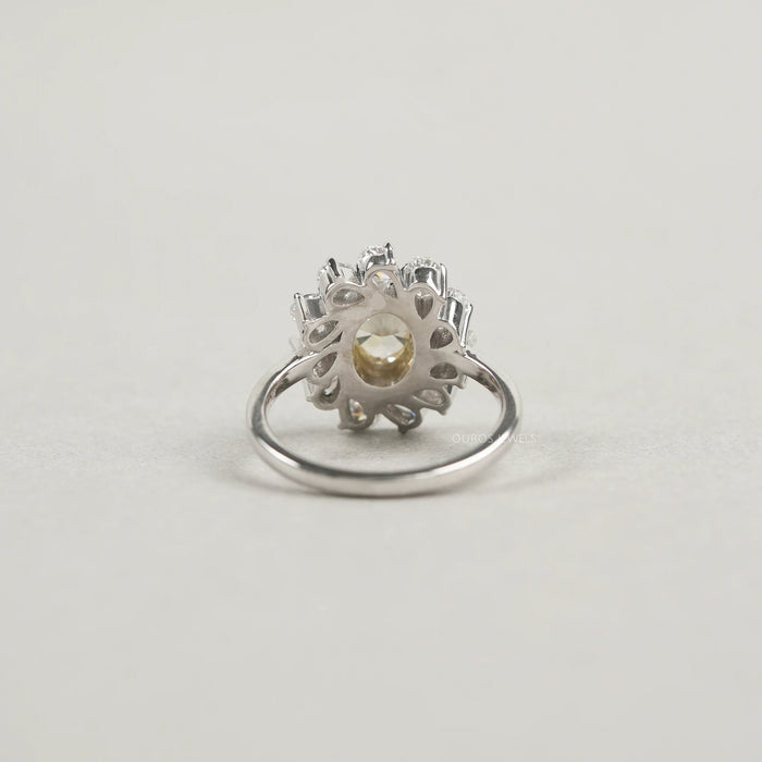 Yellow Oval Bezel Set Diamond With  Pear Halo Ring