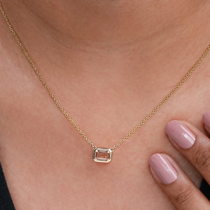 pink emerald cut diamond pendant