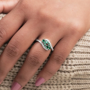 emerald gemstone bypass ring 