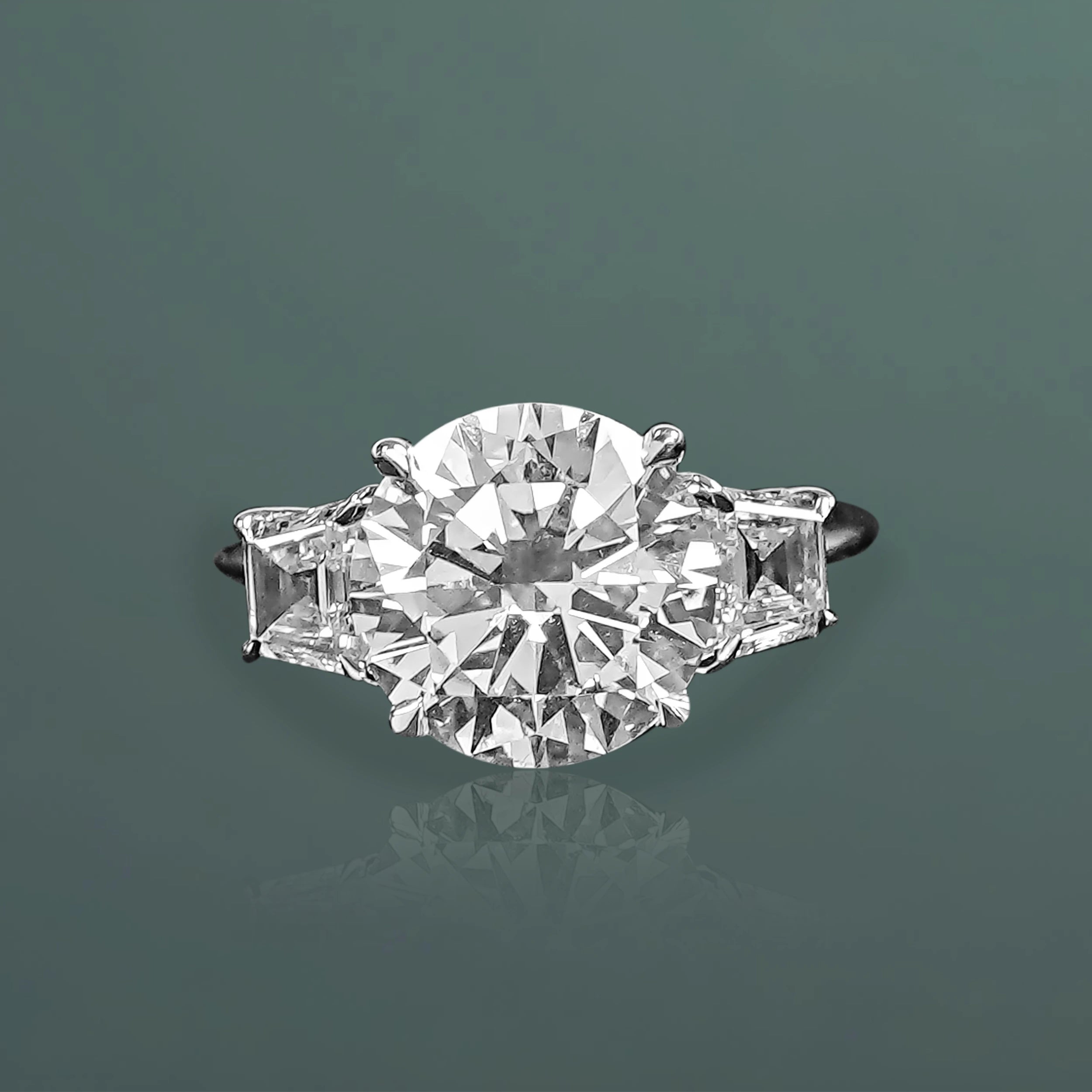 Round Diamond Three Stone Ring