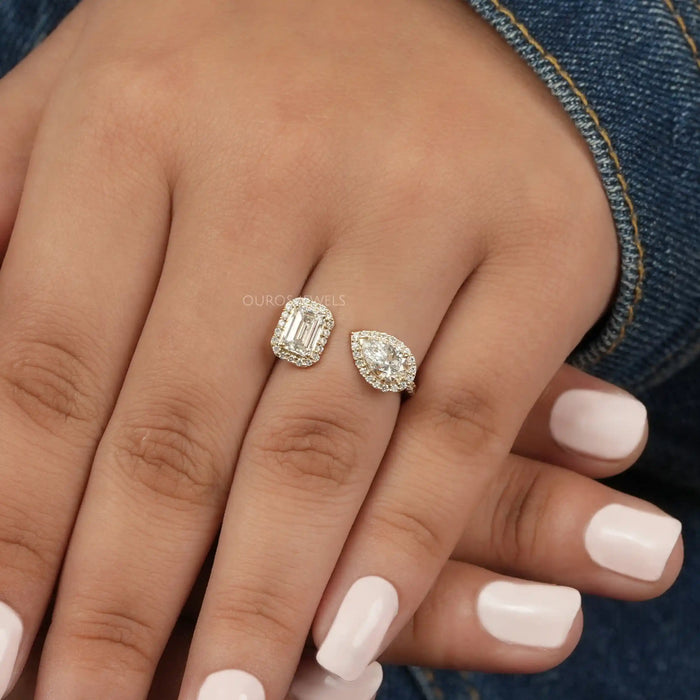 A Women wearing Pear and Emerald Diamond Halo Ring