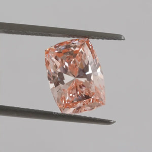 Pink Cushion Cut Modified Diamond in a Tweezer