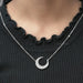 round diamond pendant in moon shape