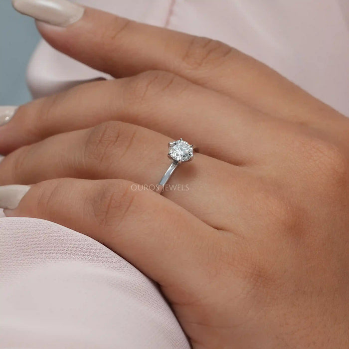 [ a women wearing solitaire diamond engagement ring in VS Clarity]-[Ouros Jewels]