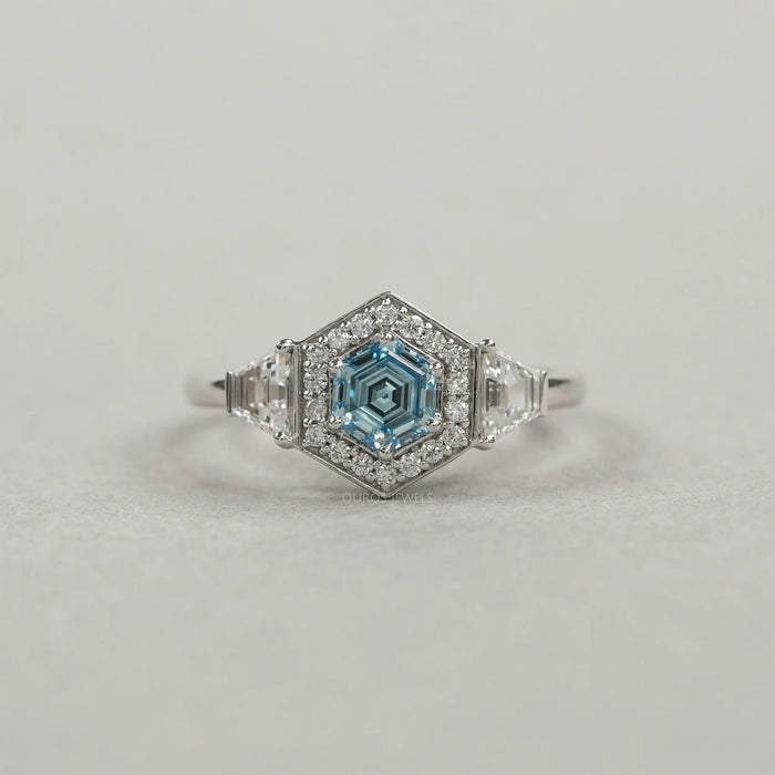 Blue Hexagon Cut Diamond Ring on White Background