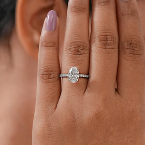 Oval Cut Diamond Engagement Ring with Side Stones