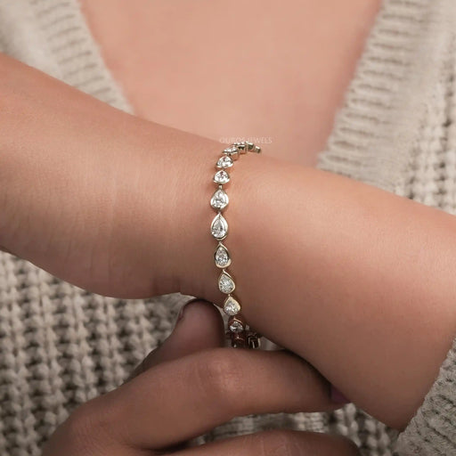 Bezel Set Pear Cut East West Set Tennis Bracelet