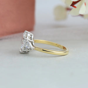 Three Stone Engagement Ring with a Hexagonal Step-Cut Diamond