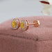 yellow oval diamond stud earrings in rose gold