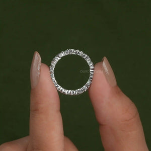 A Women showing back view of Marquise and Round Cut Wedding Band