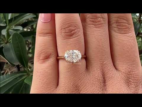 oval cut east west solitaire diamond ring