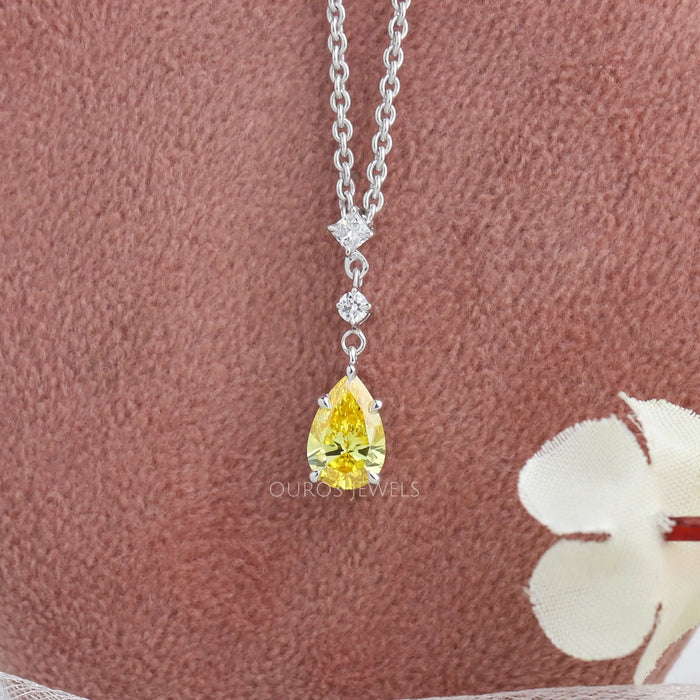 three stone pear diamond pendant