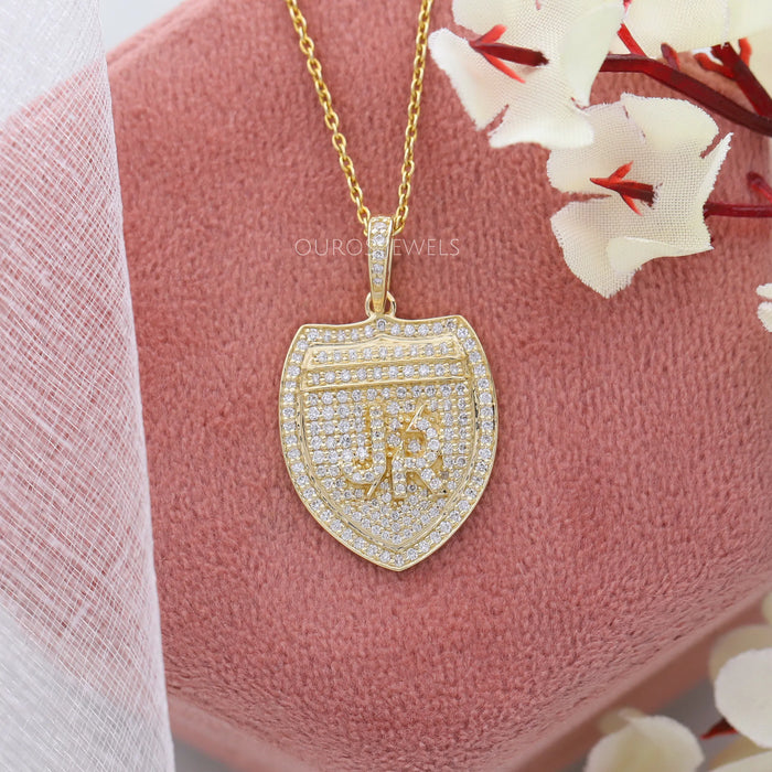 letter pendant with round diamonds