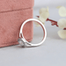 [Round diamond halo ring in white gold cathedral shank setting]-[Ouros Jewels]