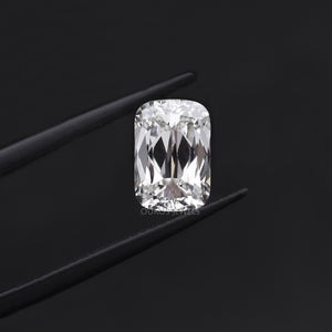 2.23 Carat IGI Certified Criss Cut Lab Diamond in holding in tweezer with dark Background.