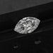 2.50 Carat Marquise Cut Loose Diamond placed on a dark wooden surface, emphasizing its detailed facets and clarity.