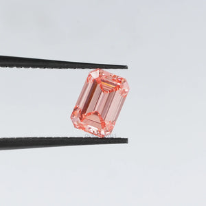 Pink emerald shape loose lab created diamond in tweezer