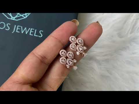 Youtube video of pear diamond floral shaped halo earrings