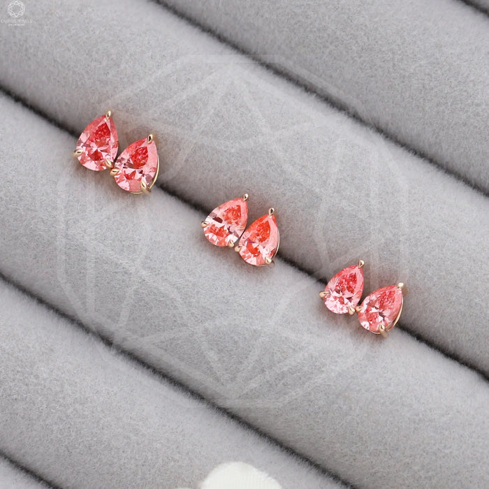 pink diamond pear stud earrings 