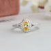 yellow oval diamond split shank engagement ring